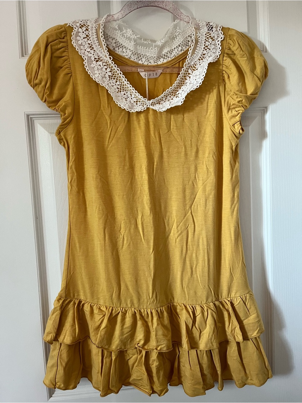 0918 women’s mustard yellow ruffle hem blouse with lace collar